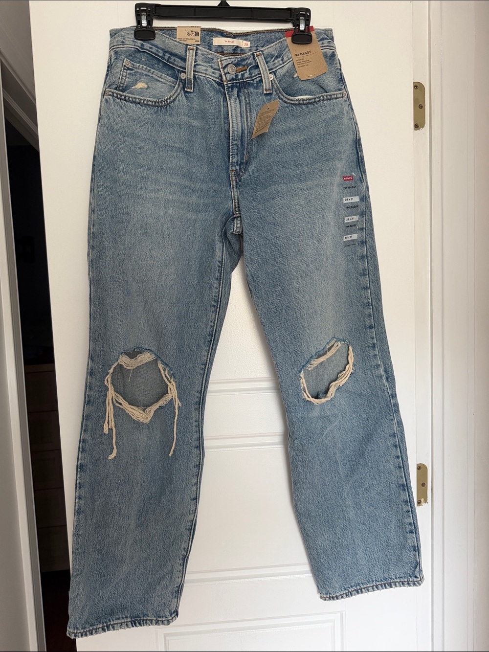 Levi’s 94 ripped baggy jeans in caution hot pants
